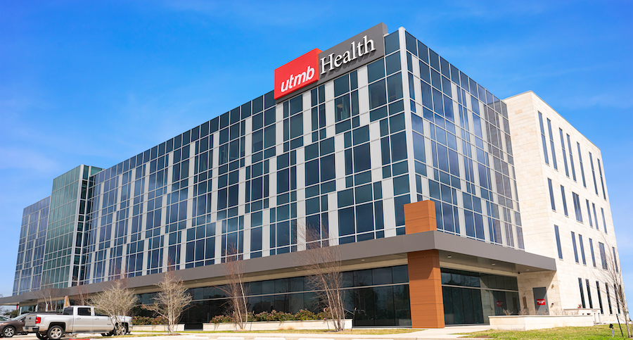 exterior image of a large building with lots of windows and a large UTMB HEALTH logo on the corner