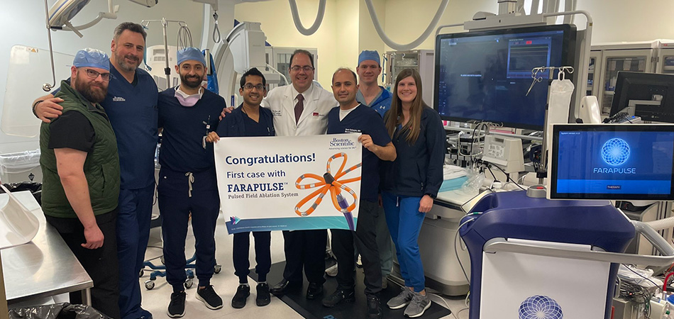 PFA ablation team holding up a congratulations sign for the 1st case with Farapulse