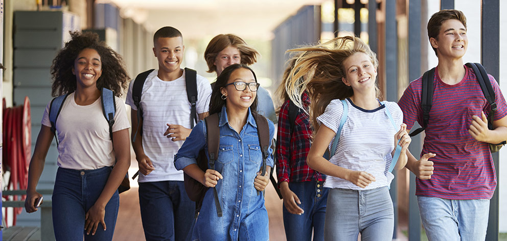 Group of teens leaving school