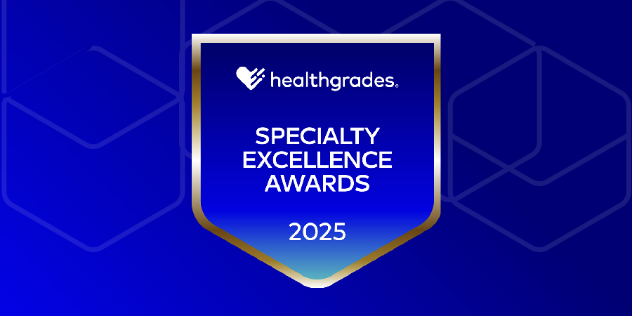 blue rectangle with gold-outlined pentagon shape that has the words "healthgrades specialty excellence awards 2025" written in white inside the gold frame