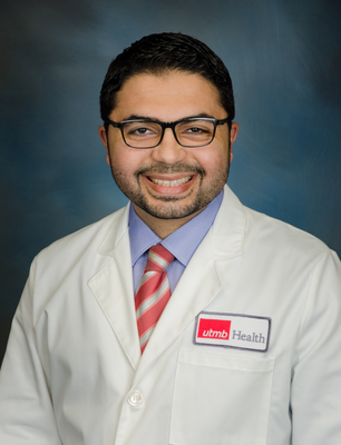 Headshot of Dr. Laith Alzweri, male physician wearing white coat, black-frame glasses, a light blue shirt and a red and white tie.