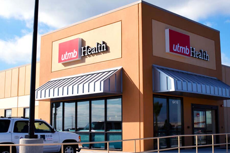 Exterior of UTMB Health Urgent Care clinic in Galveston on partly cloudy day