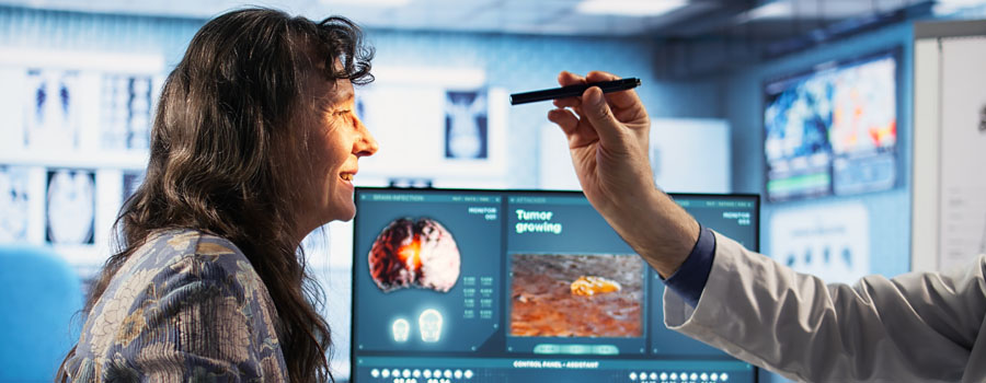 A clinician performs a cognitive assessment while a patient responds during a focused neurological evaluation.