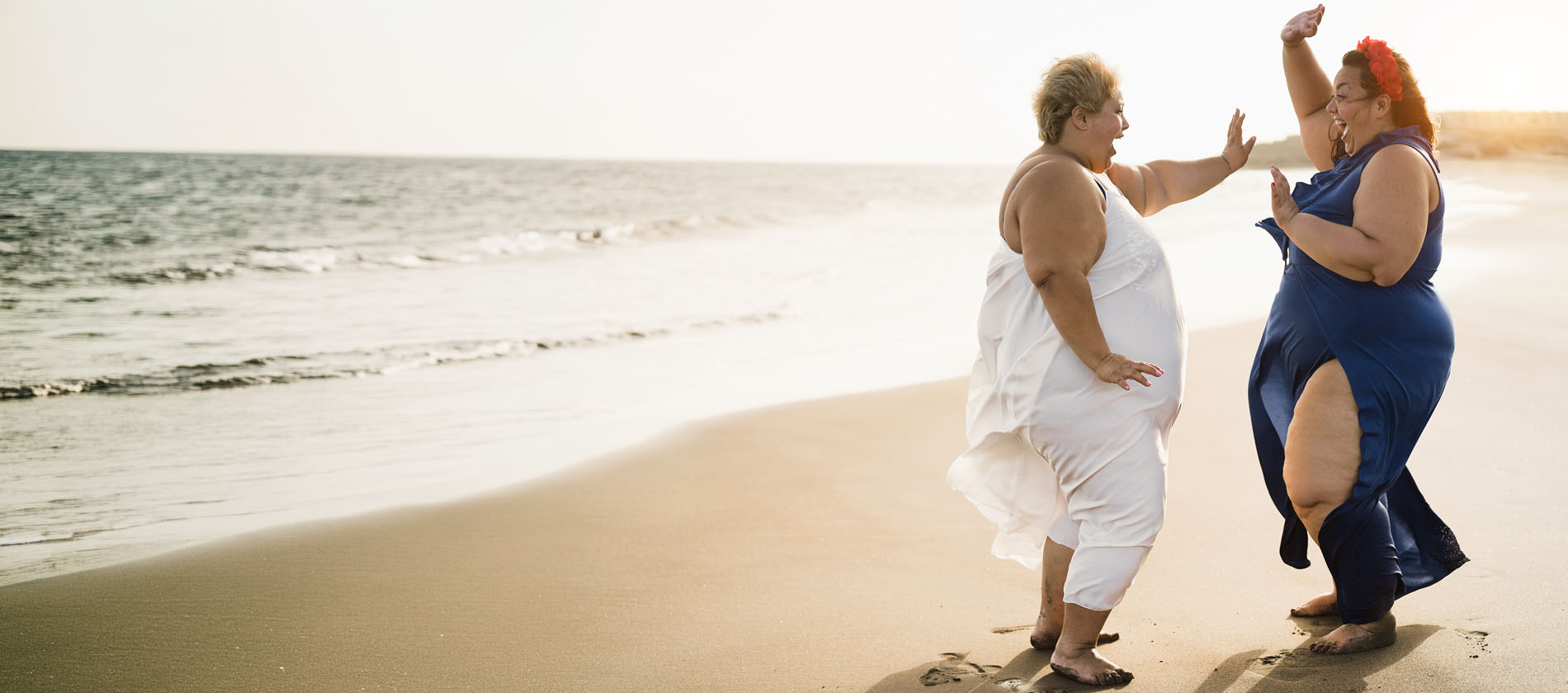 Group of women on beach that may consider weight loss surgery