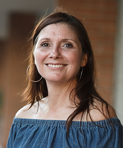 A happy woman smiling at the camera