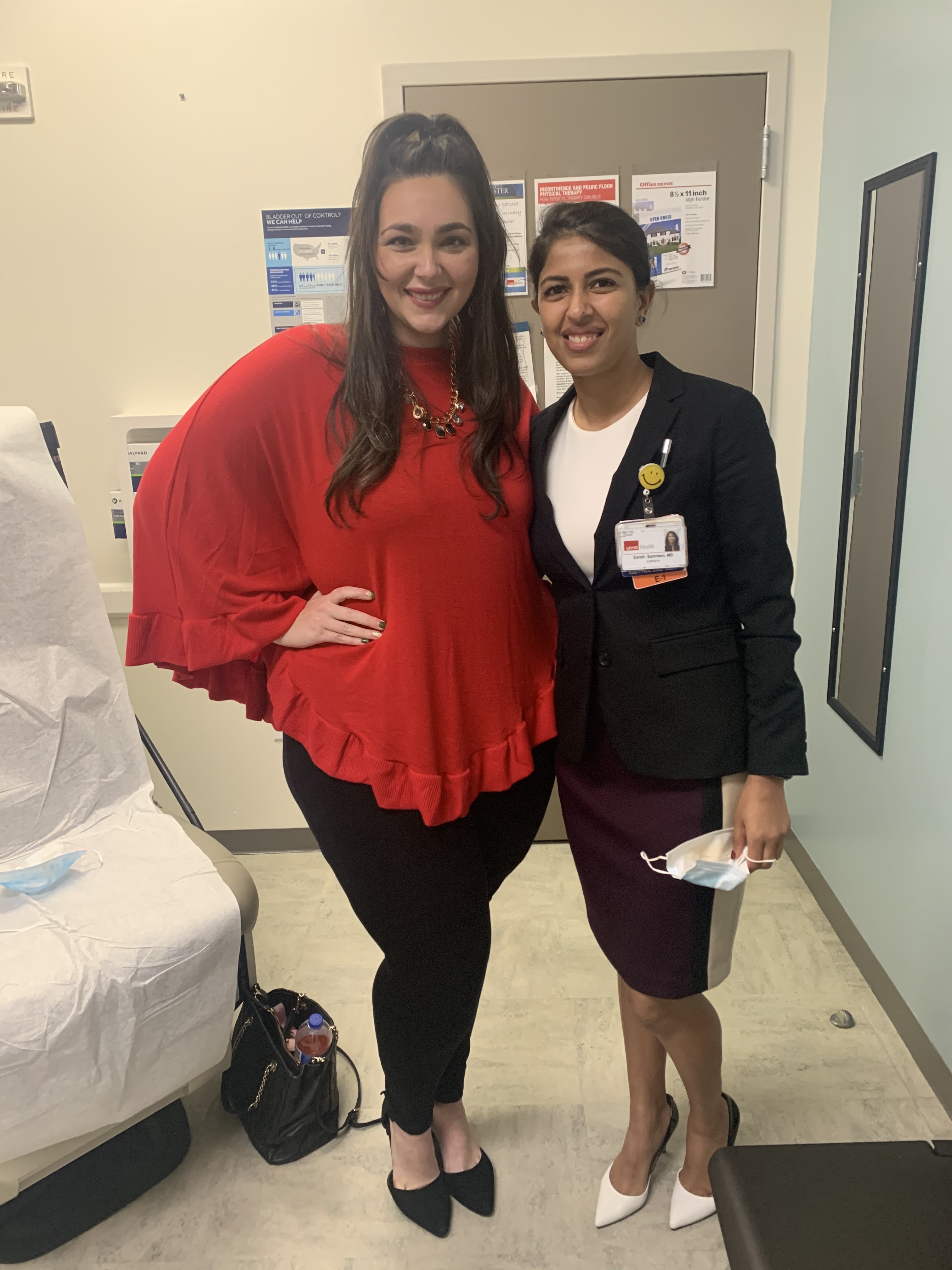 woman standing with her doctor